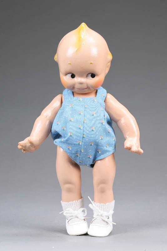 Appraisal: KEWPIE DOLL Composition jointed doll with blue flower onesie and