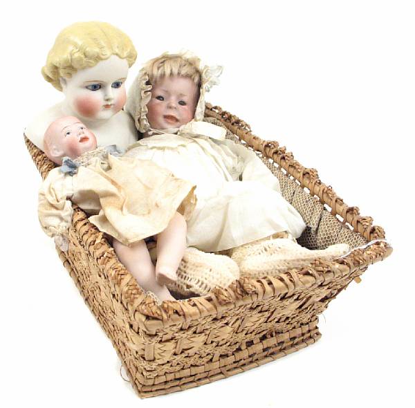 Appraisal: A group of three German bisque headed baby dolls and