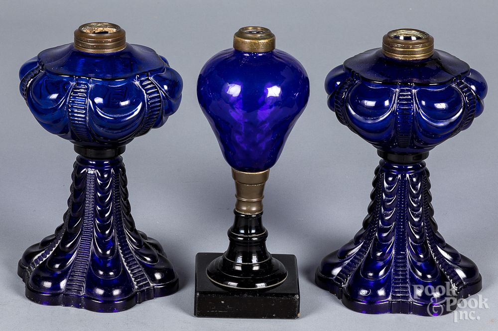 Appraisal: Three Lincoln Drape cobalt fluid lamps Two Lincoln Drape cobalt