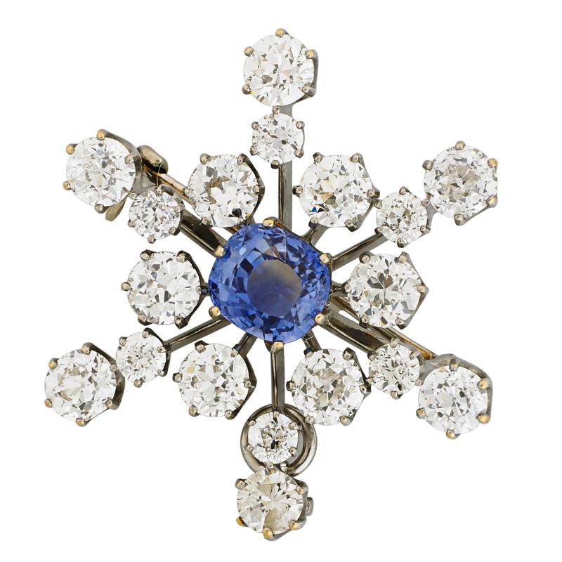 Appraisal: DIAMOND AND NATURAL BLUE SAPPHIRE STARBURST BROOCH Condition Report Most