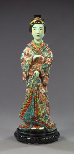 Appraisal: Large Japanese Meiji Elaborately Polychromed Porcelain Figure of a Geisha