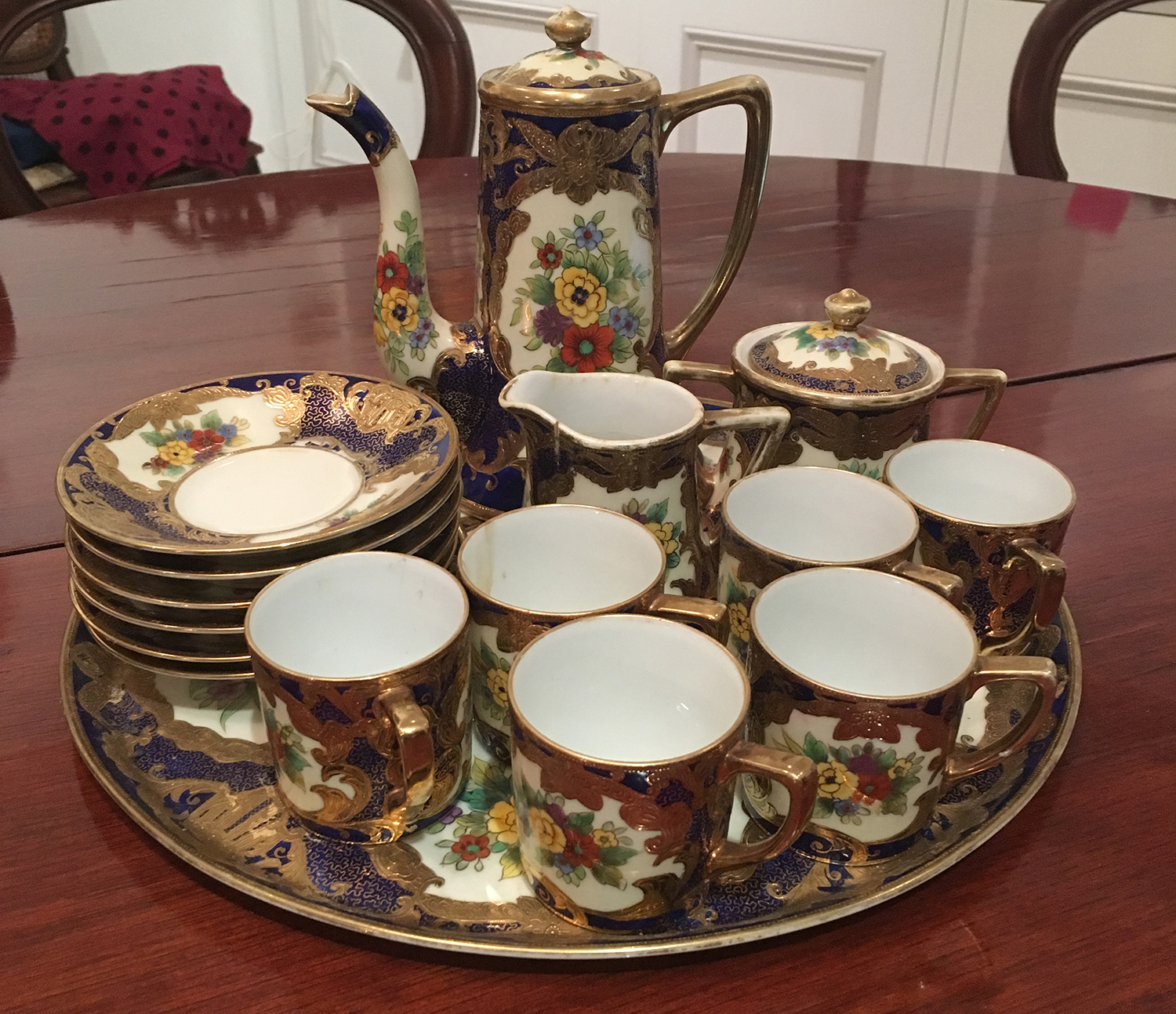 Appraisal: NORITAKE TETE-A-TETE PORCELAIN SERVICE Comprising six cups and saucers sugar