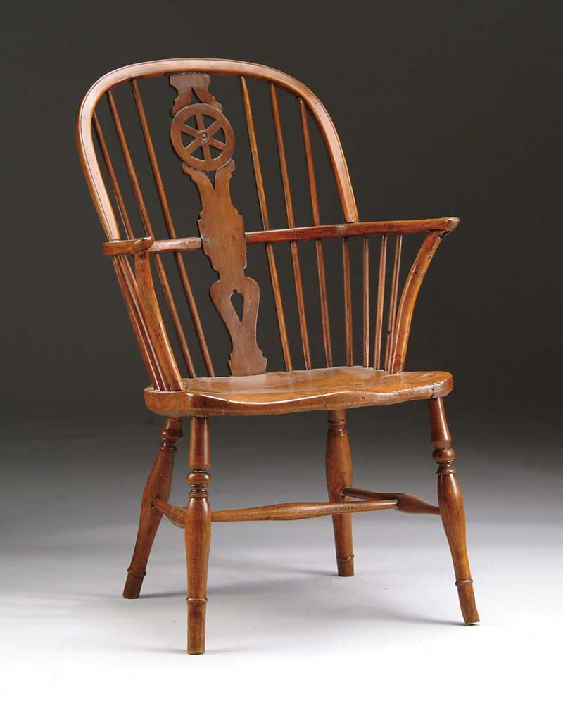 Appraisal: ENGLISH WINDSOR ARMCHAIR WITH WHEEL CARVED SPLAT th Century Nicely