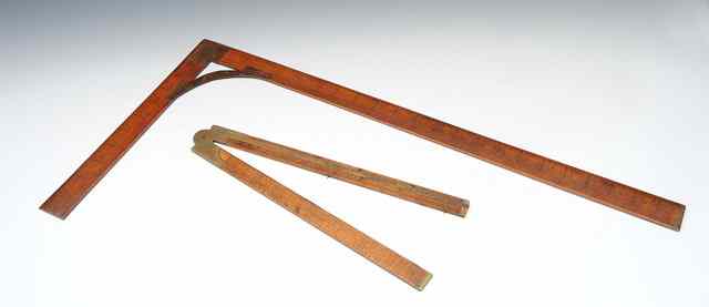 Appraisal: A X WOODEN SET SQUARE with brass mounts and a