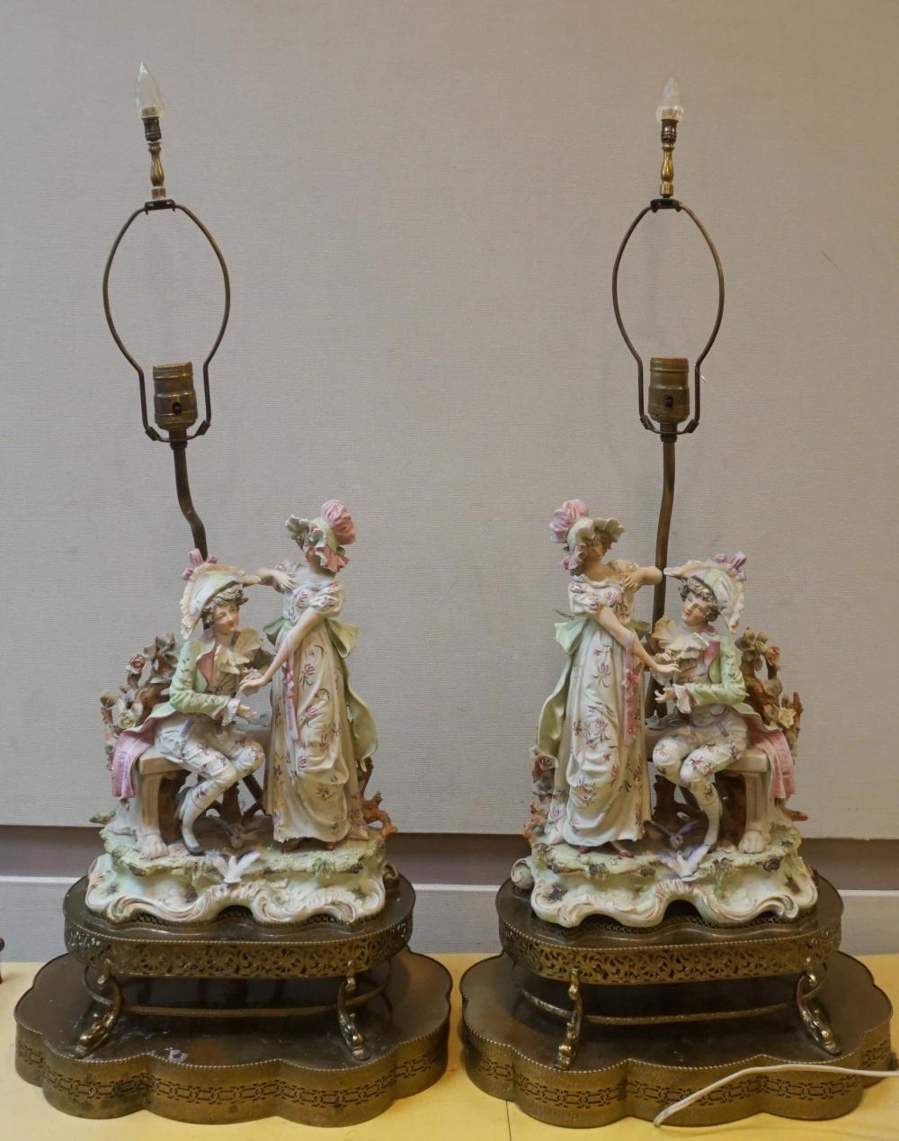 Appraisal: PAIR PORCELAIN FIGURAL GROUPS MOUNTED AS LAMPS H IN CM