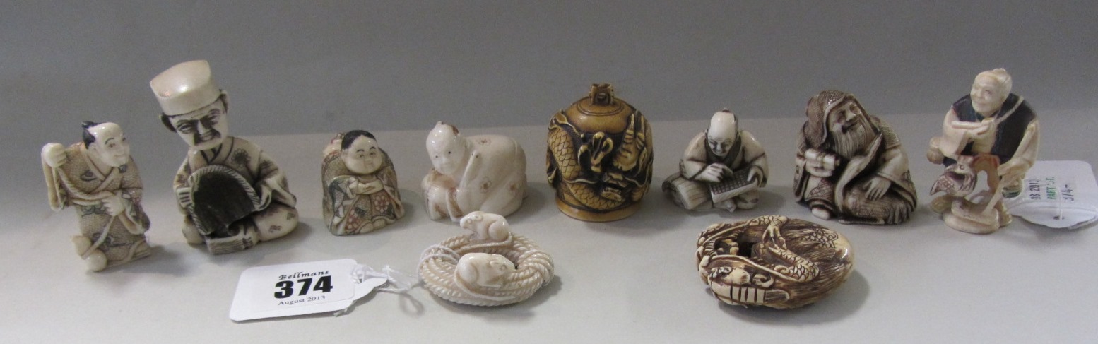 Appraisal: A group of ten ivory netsuke th century including a