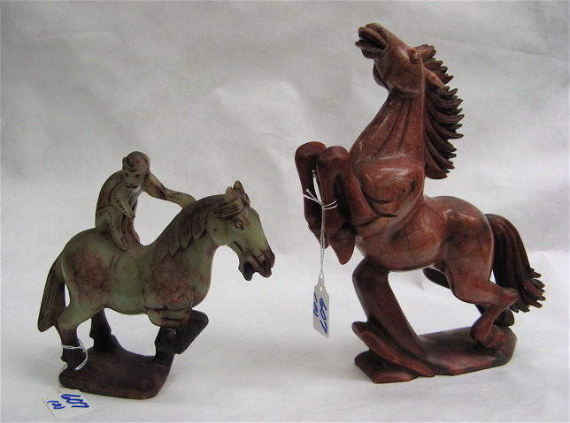 Appraisal: TWO CHINESE HAND CARVED SCULPTED HORSE FIGURES the first a