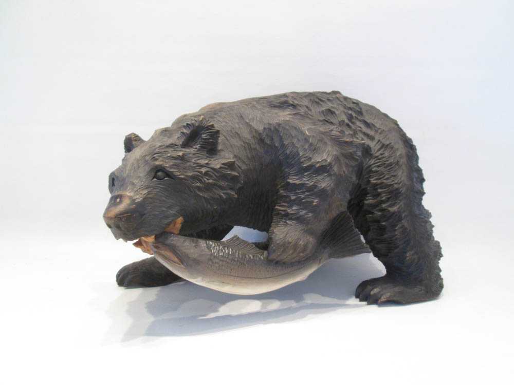 Appraisal: HAND CARVED BLACK FOREST CARVED BEAR SCULPTURE Dimensions L x