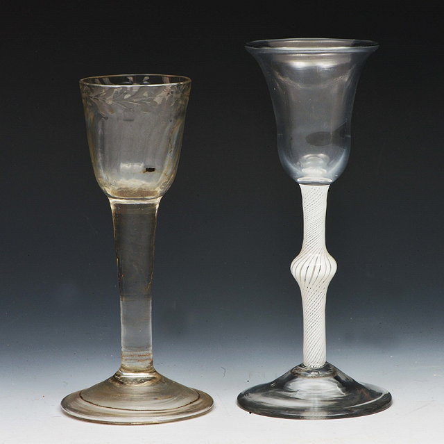 Appraisal: A WINE GLASS with inverted bell shaped bowl opaque twist