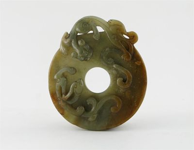 Appraisal: A Chinese jade bi disc carved in relief with two