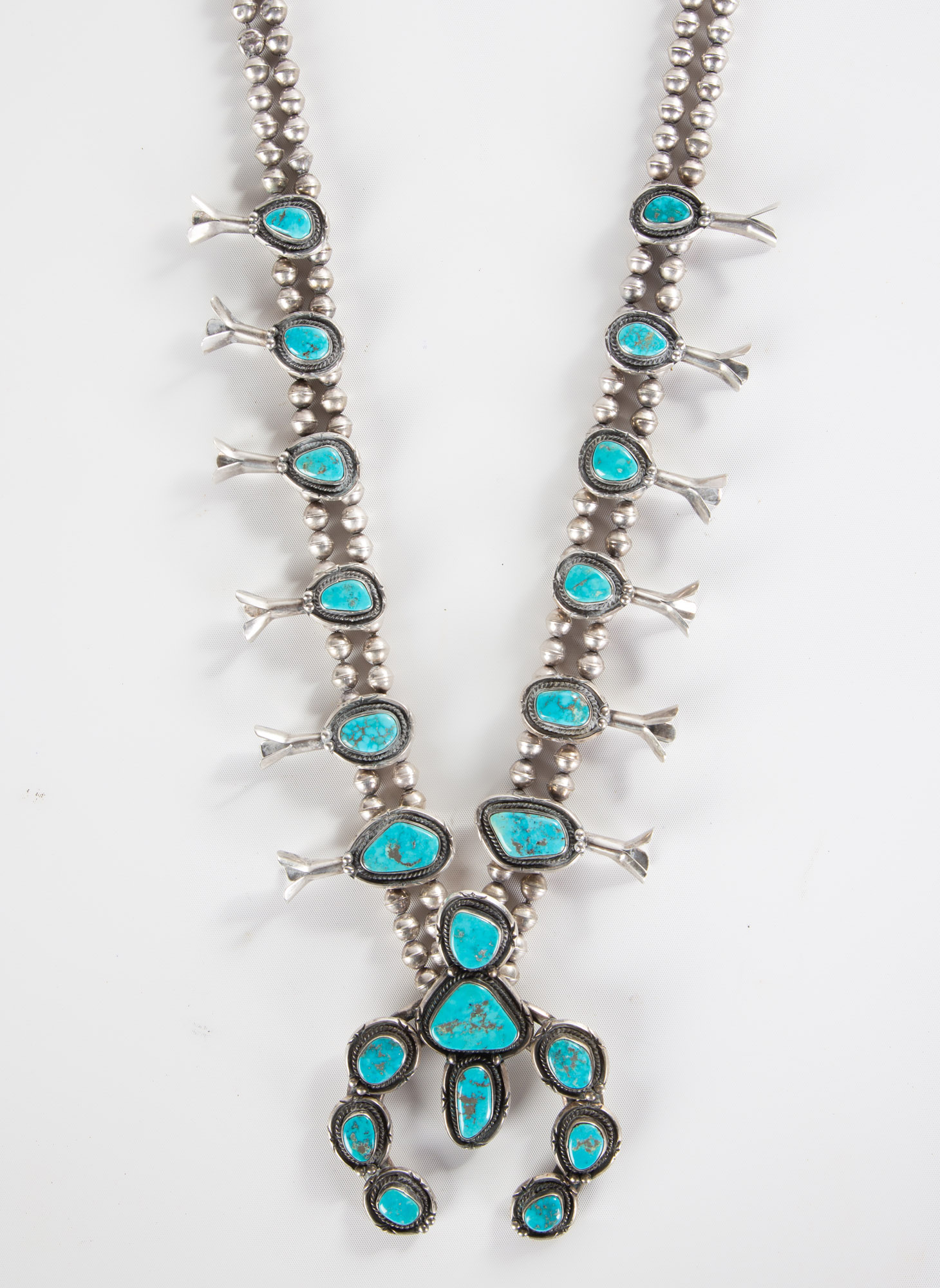 Appraisal: STERLING SILVER TURQUOISE SQUASH BLOSSOM NECKLACE Southwest Native American sterling