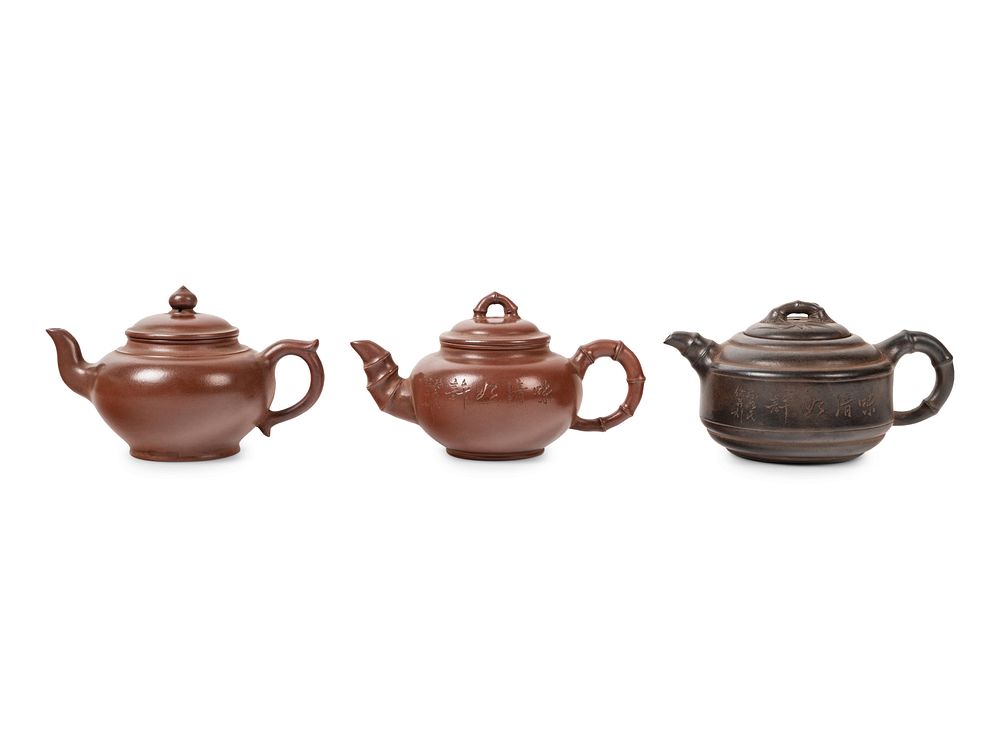 Appraisal: Three Chinese Zisha Teapots Three Chinese Zisha Teapots TH CENTURY