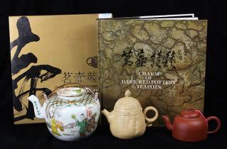 Appraisal: Group of Chinese Teapots lot of Three Chinese teapots one