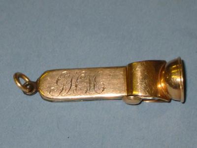 Appraisal: A CT GOLD CIGAR CUTTER chased with initials G H