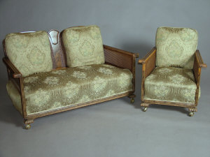 Appraisal: A 's moulded figured and stained walnut three piece bergere