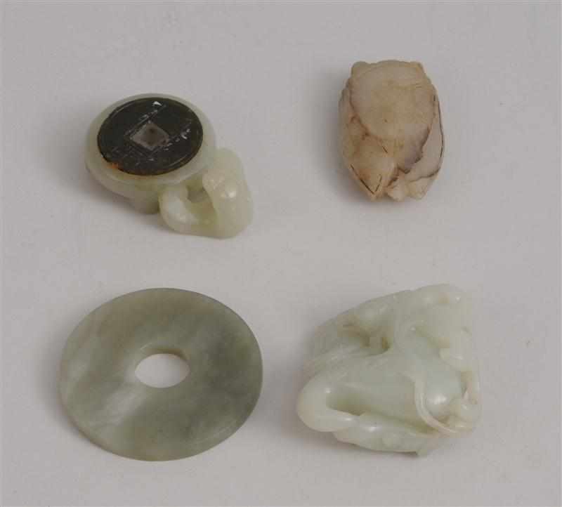 Appraisal: FOUR CHINESE CARVED JADE ARTICLES Comprising an unembellished disc a