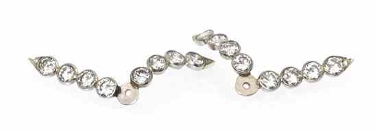 Appraisal: A Pair of White Gold Diamond Earring Enhancers containing round