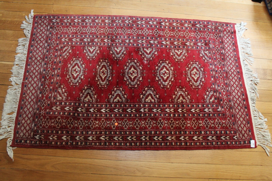 Appraisal: A Bokhara type red ground rug cm x cm