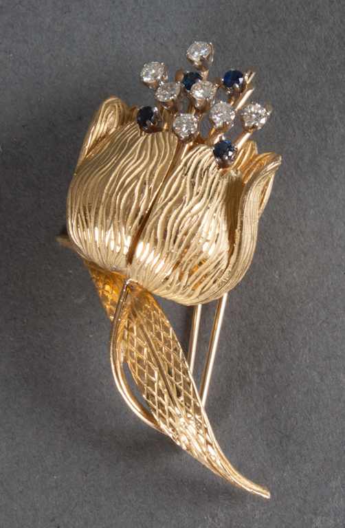 Appraisal: K gold diamond and sapphire stylized tulip-form brooch approximately grams