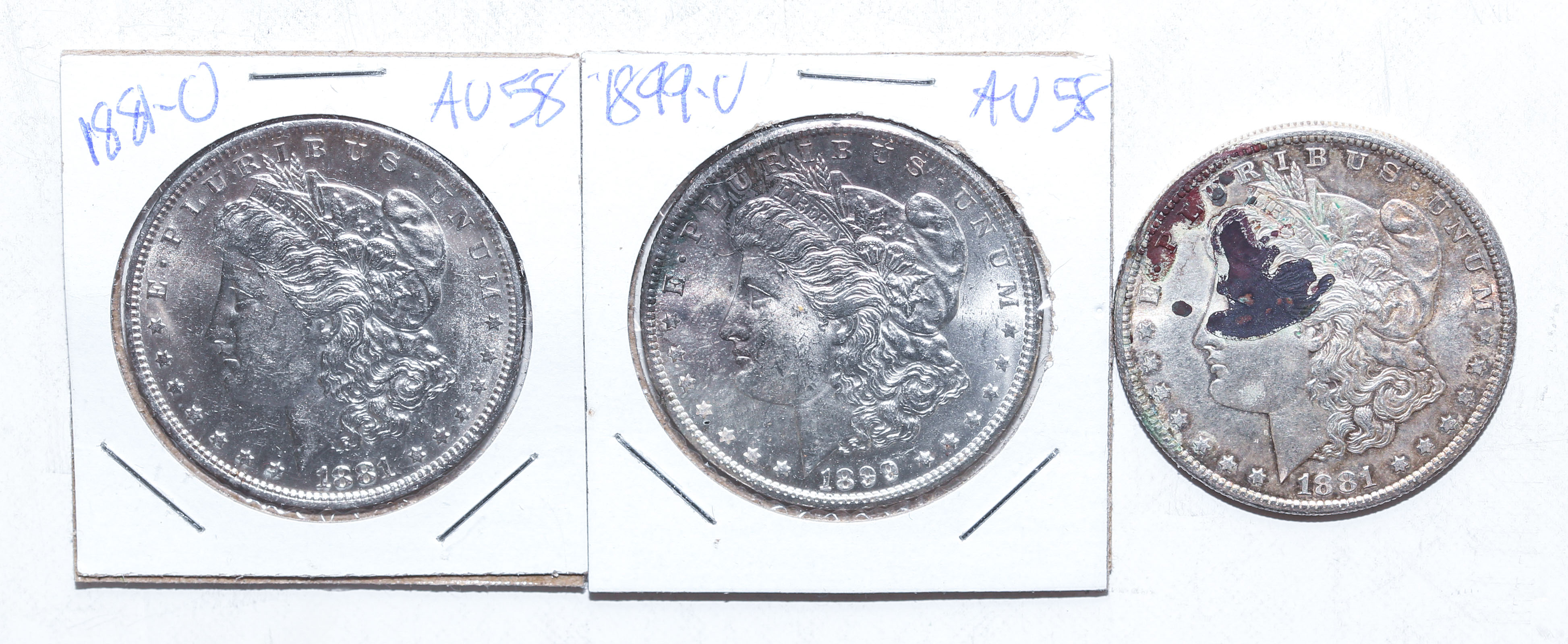 Appraisal: THREE SILVER MORGAN SILVERS -O - This could be one