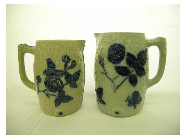 Appraisal: Two gray stoneware pitchers from Galena IL both with blue