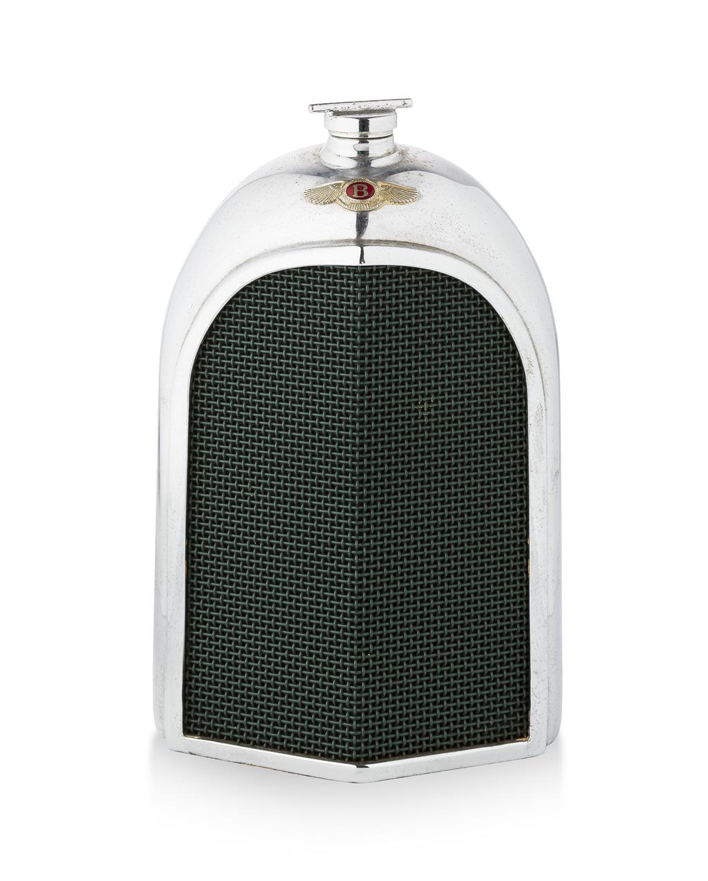 Appraisal: RUDDSPEED LTD 'BENTLEY' RADIATOR GRILLE CHROME AND GLASS SPIRIT FLASK