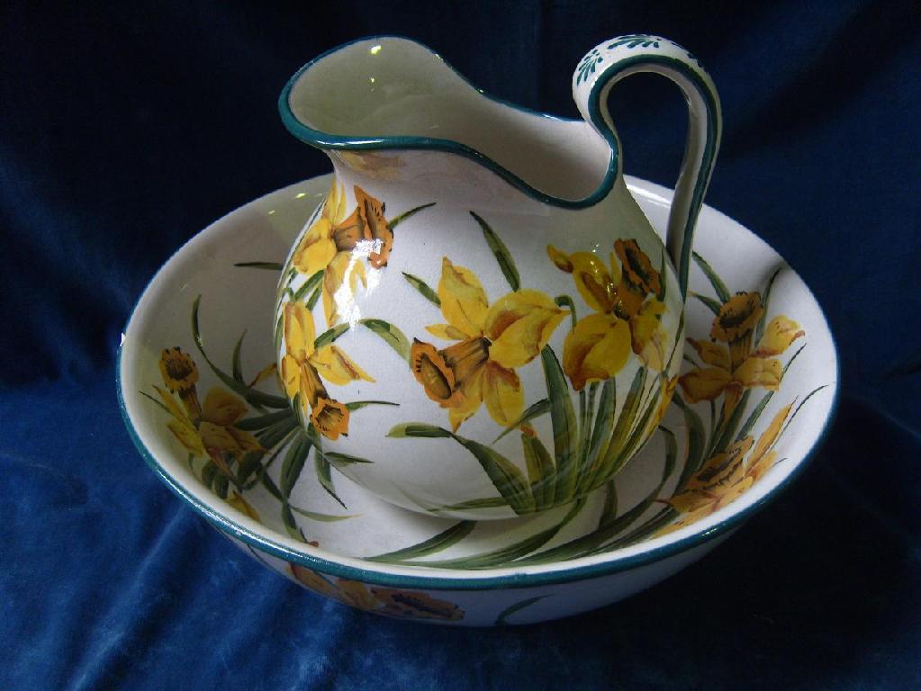 Appraisal: A Wemyss jug and basin set with painted yellow daffodil