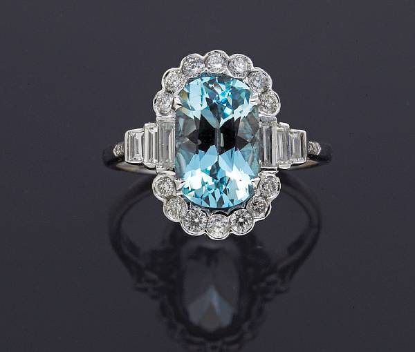 Appraisal: An aquamarine and diamond ring aquamarine weighing carats mounted in