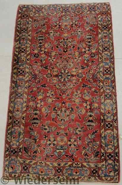 Appraisal: Sarouk oriental throw mat red field floral patterns ' x