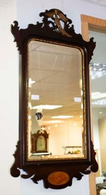 Appraisal: A George III style mahogany parcel gilt fretwork wall mirror