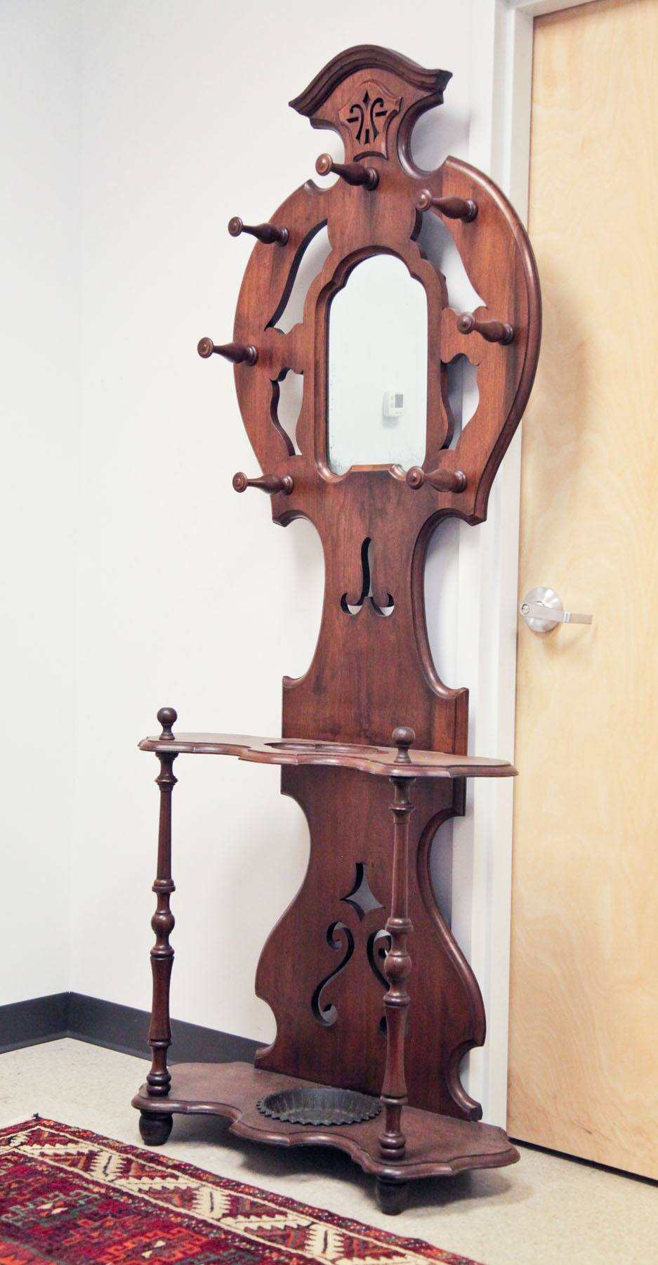 Appraisal: VICTORIAN HALL TREE American early th century Walnut having an