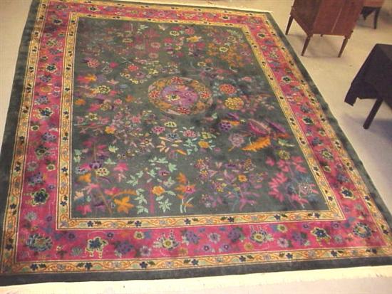 Appraisal: Chinese Art Deco room size carpet 's polychrome floral motif