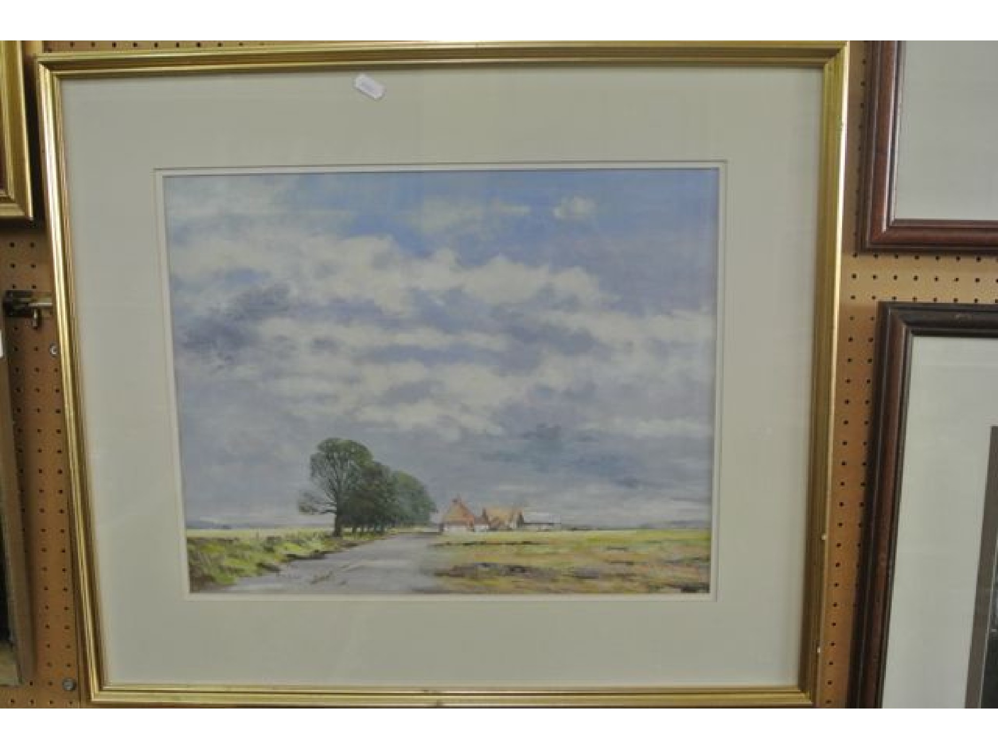 Appraisal: An acrylic study of a landscape with farm buildings signed