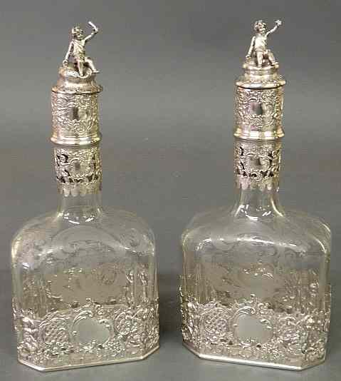 Appraisal: Pair of German silver and etched glass decanters the stoppers