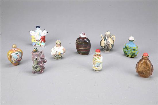 Appraisal: NINE SNUFF BOTTLES Four porcelain two stone one Peking glass