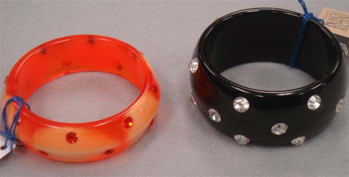 Appraisal: Two plastic and rhinestone bangle bracelets vivid orange with orange