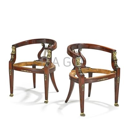 Appraisal: PAIR OF FRENCH EMPIRE STYLE ARM CHAIRS Mahogany frames with