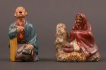 Appraisal: Pair of Papier Mache Figures Pair of oriental-inspired papier mache