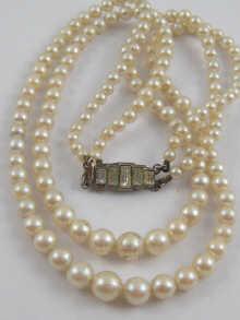 Appraisal: A two row graduated cultured pearl necklace cm long pearl