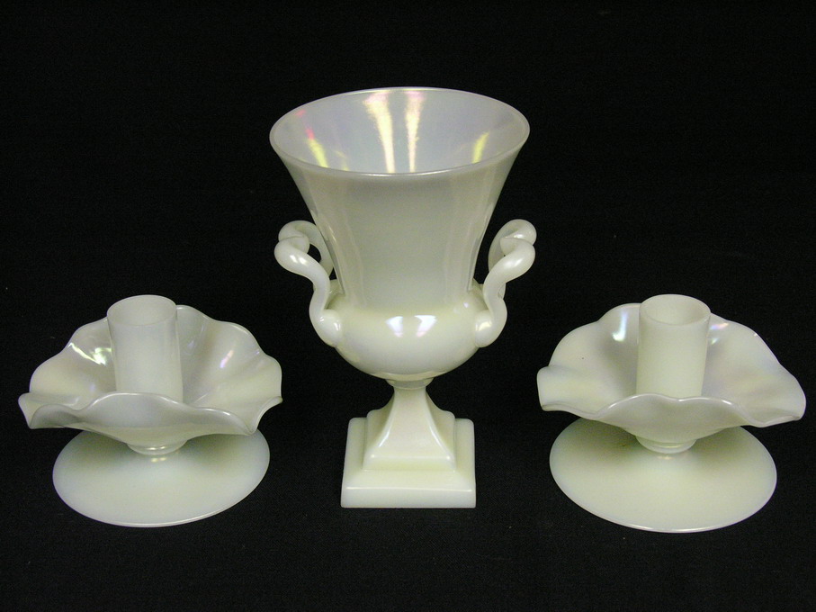 Appraisal: PC STEUBEN URN CANDLE HOLDER SET Original foil labels Urn