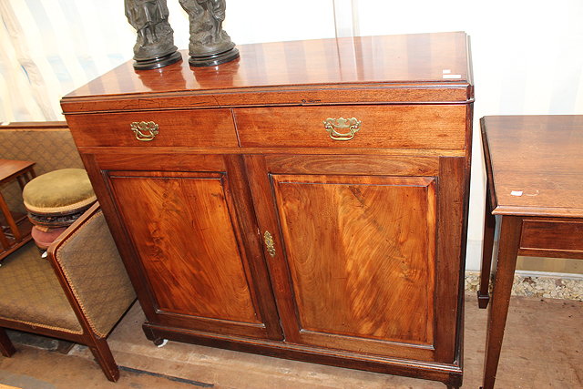 Appraisal: A MAHOGANY SIDE CABINET caddy top over two frieze drawers