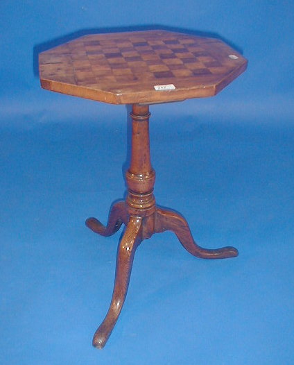 Appraisal: A Georgian oak tripod table with walnut and chequerboard veneered