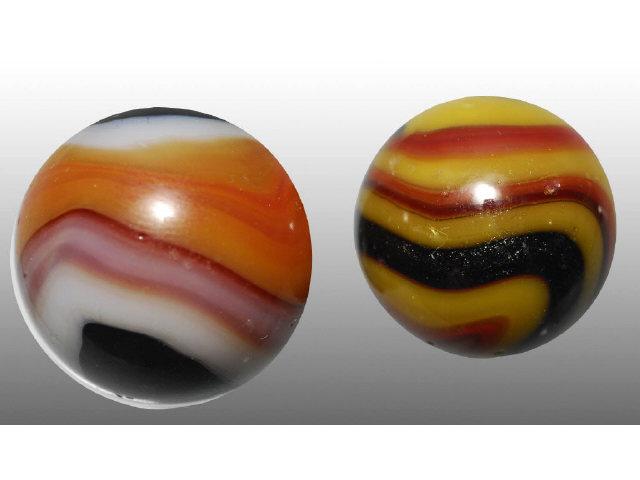 Appraisal: Lot of Machine Made Acro Agate Marbles Description Golden Rebel