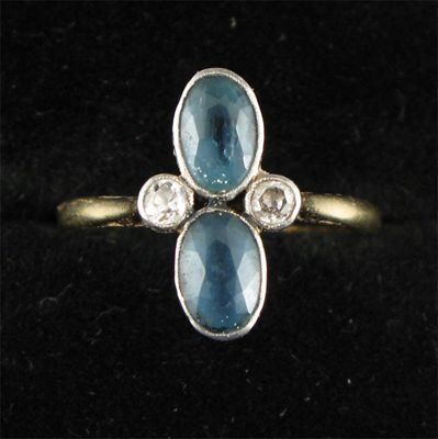 Appraisal: An early th century aquamarine and diamond four stone ring