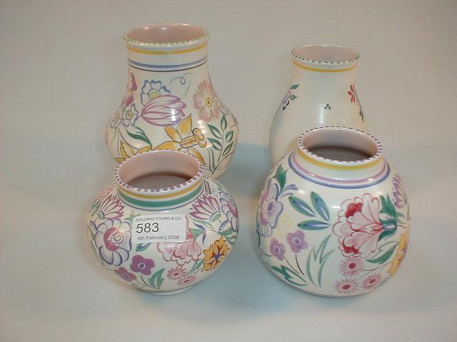 Appraisal: Four Poole pottery vases impressed numbers and