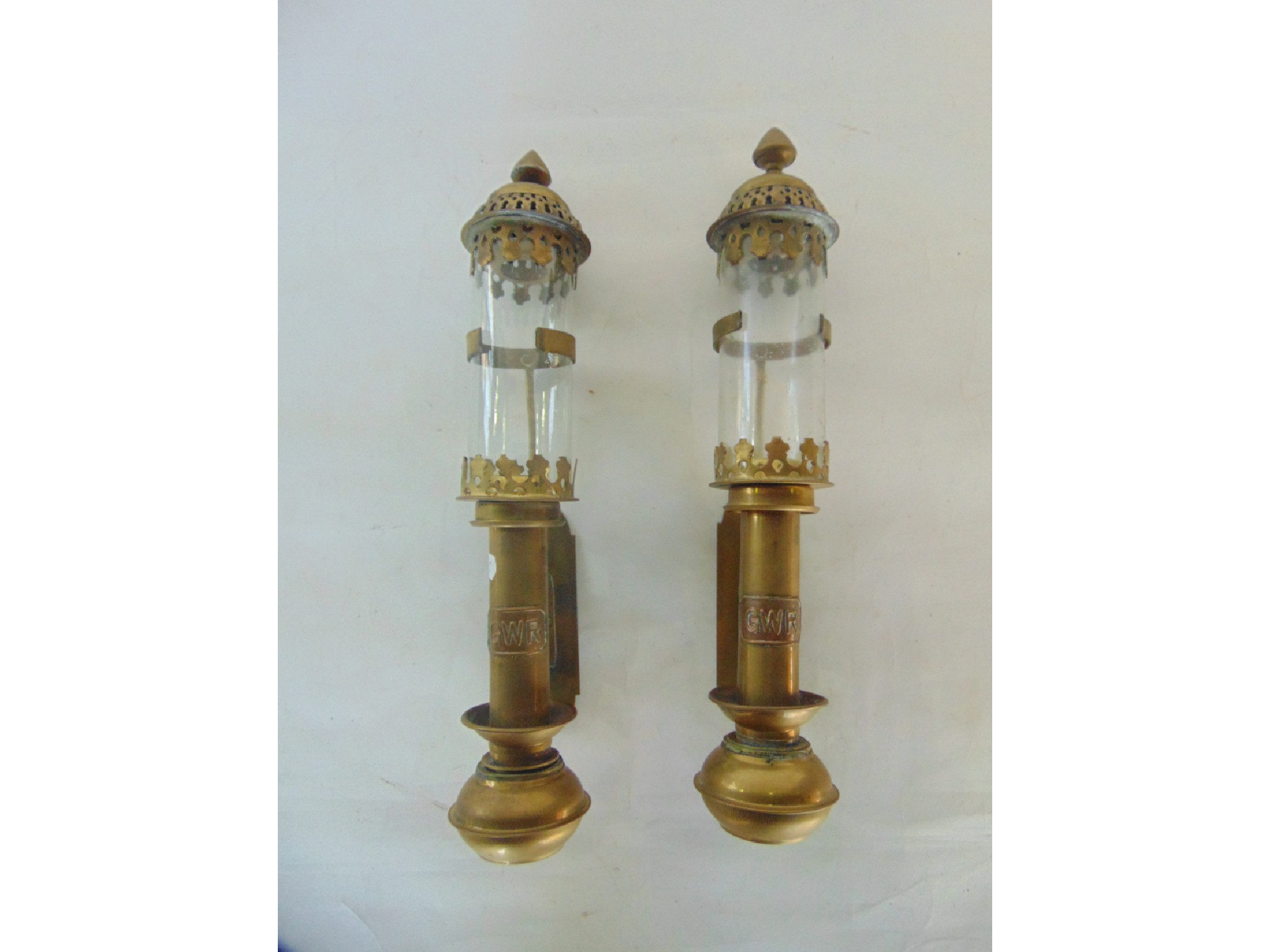 Appraisal: Railwayana a pair of brass wall mounting candle sconces with