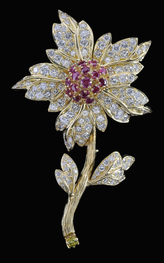 Appraisal: Diamond and Ruby Floral Brooch set with round brilliant-cut diamonds