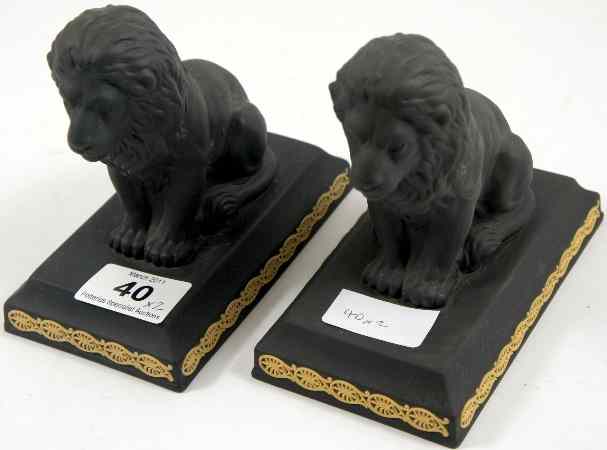 Appraisal: Pair of Wedgwood Black Basalt Lions on Rectangular Bases height