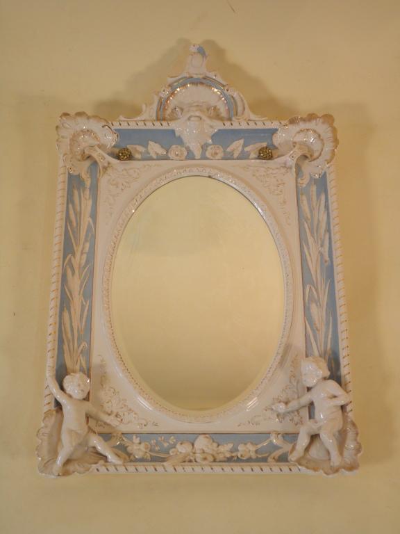 Appraisal: A late thC Staffordshire pottery rectangular mirror frame the arched