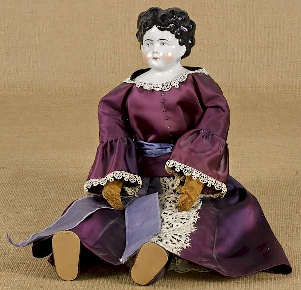 Appraisal: German China head and shoulder molded hair doll w German